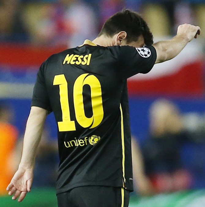 Barcelona's Lionel Messi reacts during his team's match against Atletico Madrid
