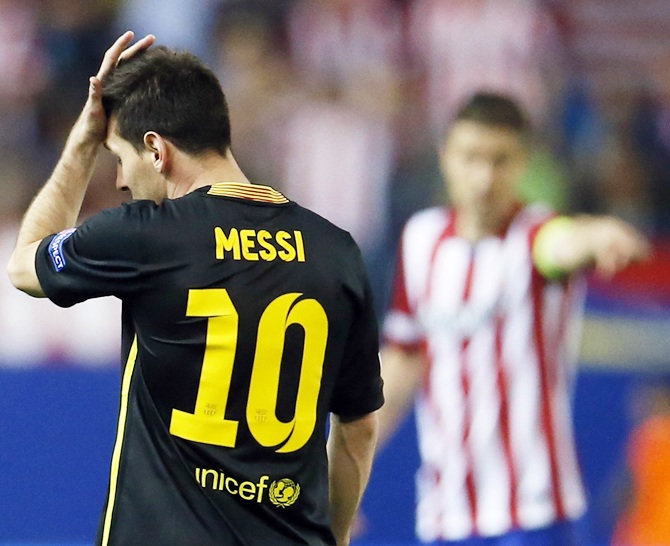 Barcelona's Lionel Messi reacts