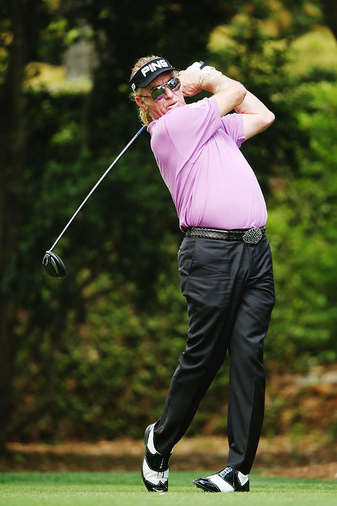 Miguel Angel Jimenez of Spain hits his tee shot on the second hole during the final round of the 2014 Masters Tournament at Augusta National Golf Club on Sunday