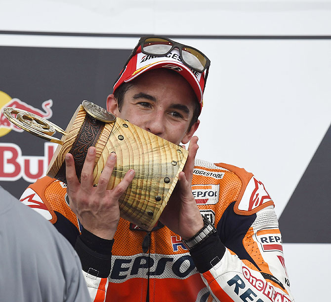 Marc Marquez of Spain and Repsol Honda Team celebrates on the podium at the end of the MotoGp Red Bull U.S. Grand Prix of The Americas race at Circuit of The Americas on Sunday