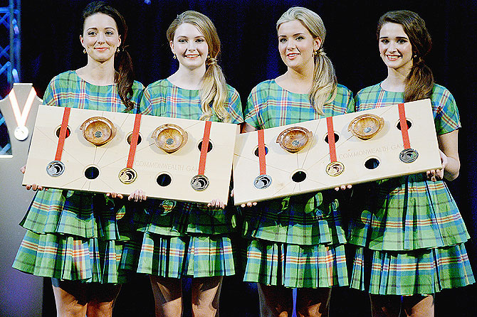 Lily Forbes, Kathryn Malone, Sarah Bird and Sara Montaghain present the Commonwealth Games Gold, Silver and Bronze medals at the unveiling at Kelvingrove Art Gallery and Museum in Glasgow, Scotland on Monday