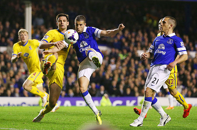 Jose Campana of Crystal Palace and Kevin Mirallas of Everton compete for the ball during their match on Wednesday