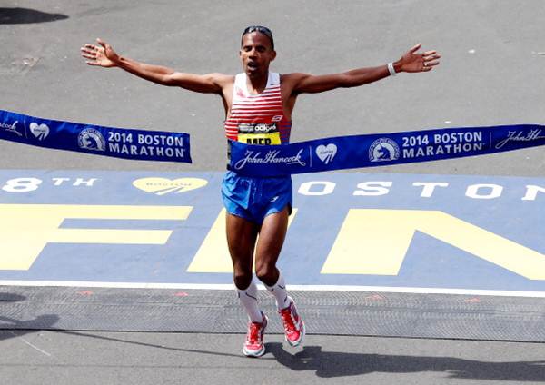  Meb Keflezighi of the United States crosses the finish line to win the 118th Boston Marathon