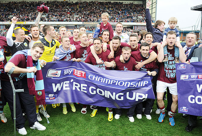 Burnley celebrate following the Sky Bet Championship match between Burnley and Wigan Athletic at Turf Moor in Burnley on Monday