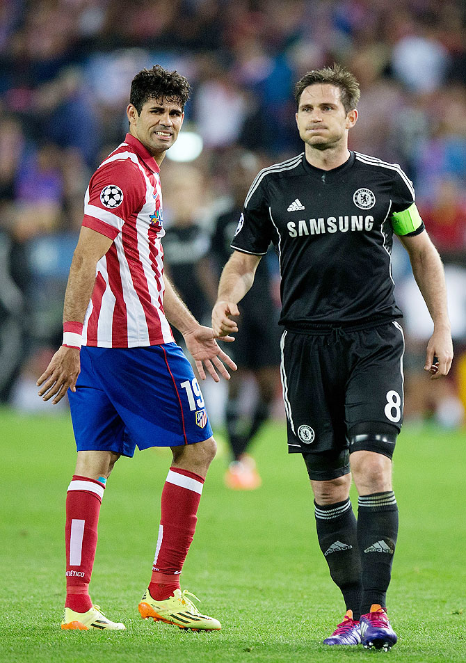Diego Costa (left) of Atletico de Madrid looks on with Frank Lampard (right) of Chelsea FC during their Champions League semi-final first leg match at Vicente Calderon Stadium on Tuesday