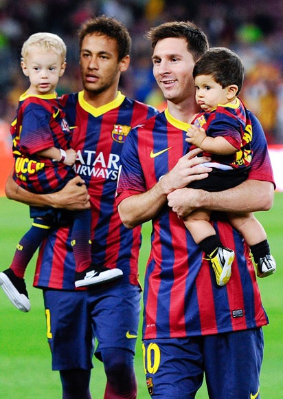 Neymar of FC Barcelona with son Davi Lucca (left) and team-mate Lionel Messi with son Thiago