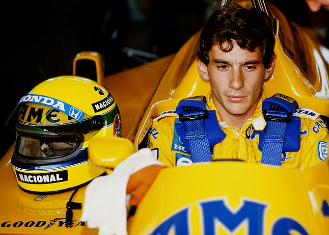 Ayrton Senna of Brazil sits aboard the #12 Camel Team Lotus Honda Lotus 99T Honda RA166E V6 turbo during practice for the Brazilian Grand Prix on 11th April 1987 at the Autodromo Internacional Nelson Piquet Jacarepagua circuit near Rio de Janeiro, Brazil