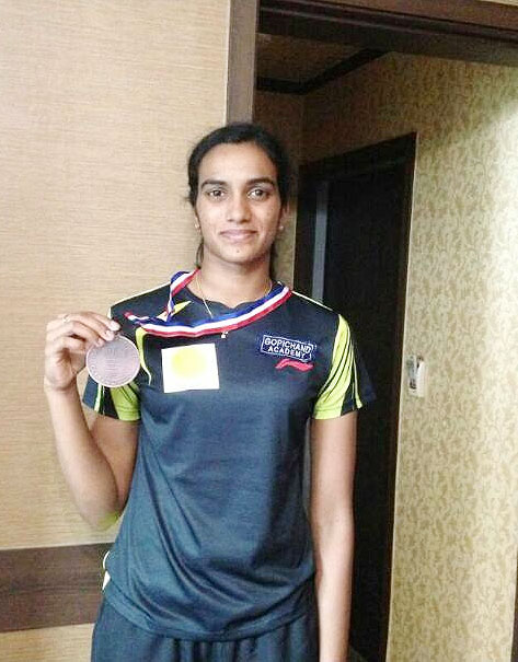 PV Sindhu poses with the Asian Championships bronze medal on Saturday