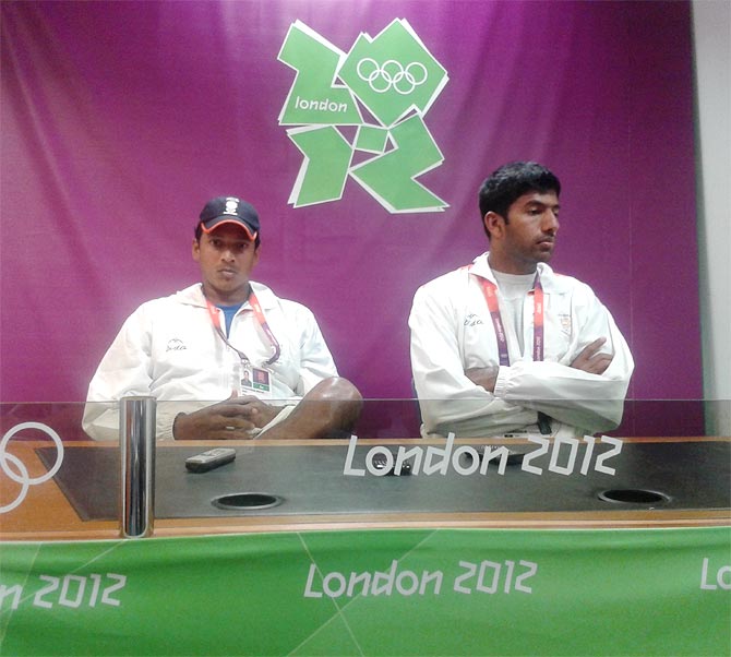 Mahesh Bhupathi (left) with Rohan Bopanna speak to reporters after their exit from the 2012 London Olympics.