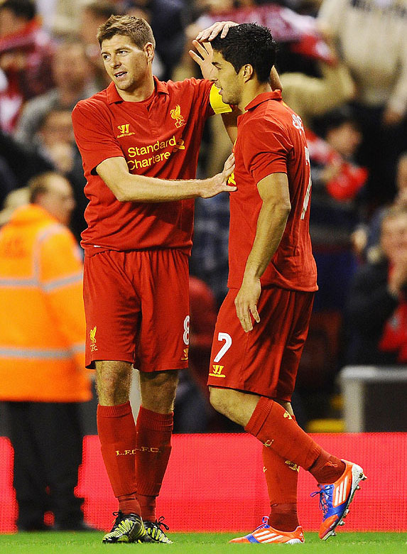 Liverpool's Steven Gerrard and teammate Luis Suarez