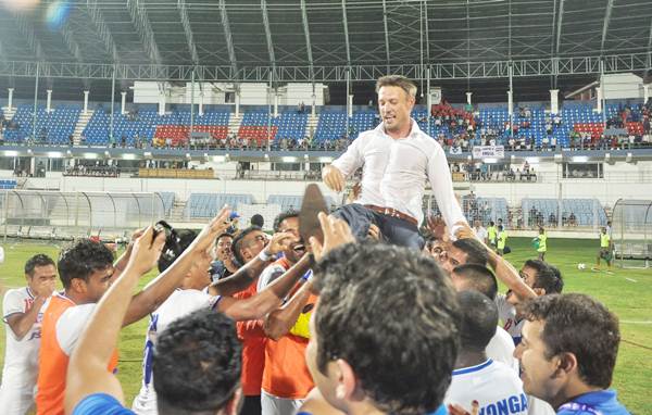 Bengaluru FC players hoist their coach Ashley Westwood after beating Sporting Clube de Goa and ending their I-League campaign on a winning note.