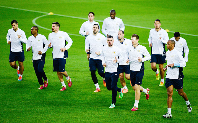 Manchester City players at a training session 
