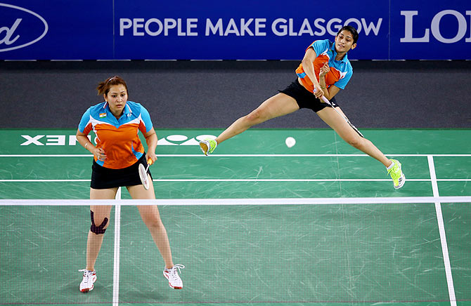 Ashwini Ponnappa and Jwala Gutta of India in action at the Glasgow 2014 Commonwealth Games
