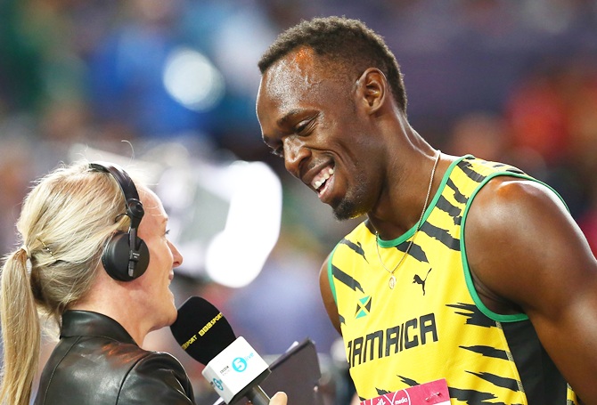 Usain Bolt of Jamaica of Jamaica speaks to the media