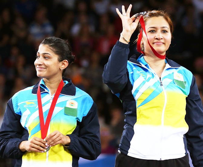 Silver medalists Ashwini Ponnappa and Jwala Gutta during the medal ceremony