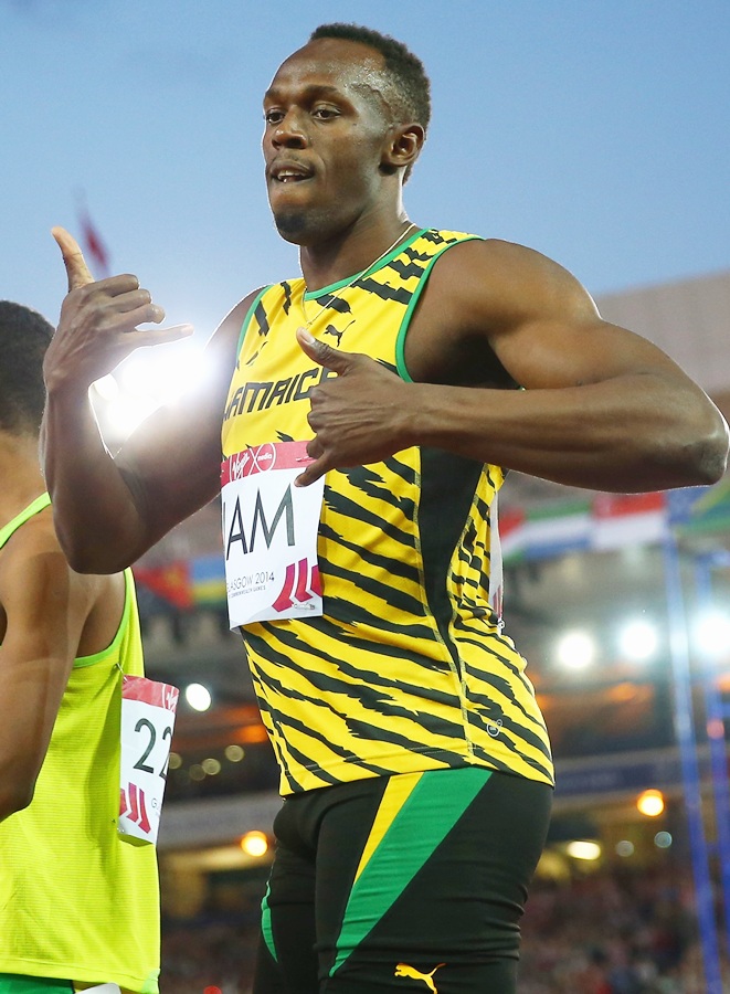 Usain Bolt of Jamaica competes in the Men's 4x100 metres relay