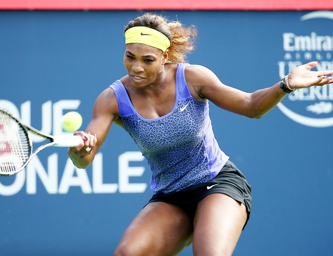 Serena Williams of the USA returns a shot to Lucie Safarova of the Czech Republic