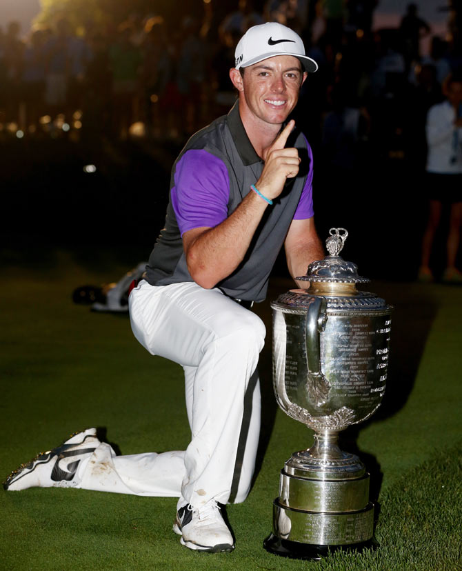 Rory McIlroy of Northern Ireland poses with the Wanamaker trophy after his one-stroke victory during the final round of the 96th PGA Championship at Valhalla Golf Club in Louisville, Kentucky, on Sunday