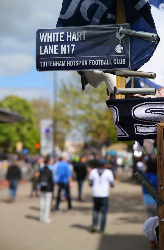 A sign for White Hart Lane is seen on street stall ahead of the Barclays Premier League match 