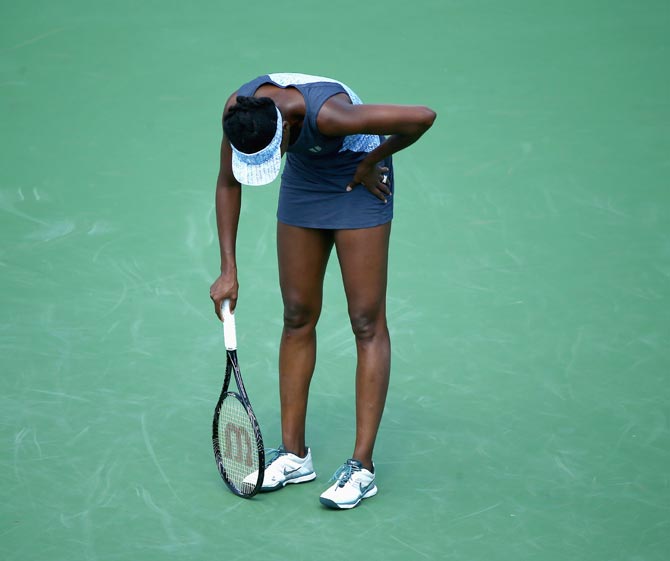 Venus Williams is dejected after losing a point during her match