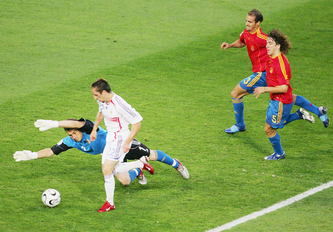 Frank Ribery of France scores his team's first goal past the dive of Iker Casillas of Spain during the 2006 FIFA World Cup Round of 16 match at the Stadium Hanover in Hanover on June 27., 2006