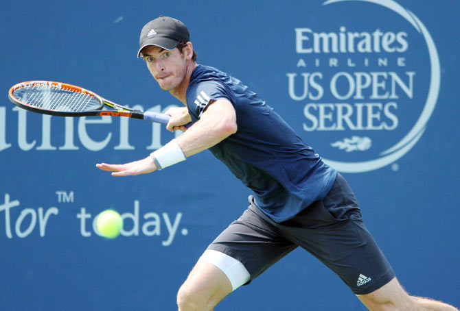 Andy Murray returns a shot from Joao Sousa on day three of the Western and Southern Open tennis tournament at Linder Family Tennis Center on Wednesday