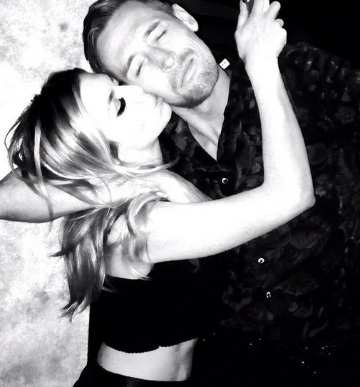 Abbey Clancy kisses Peter Crouch