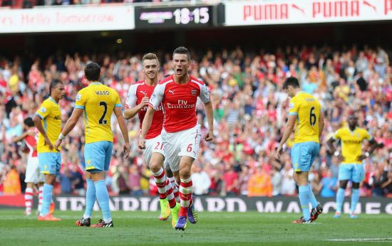 Laurent Koscielny f Arsenal celebrates his goal during the Barclays Premier League match between Arsenal and Crystal Palace