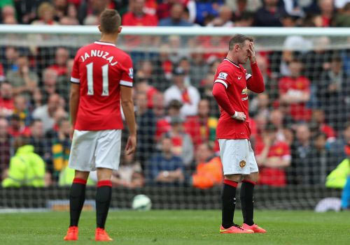 Wayne Rooney of Manchester United looks dejected during the Barclays Premier League match between Manchester United and Swansea City