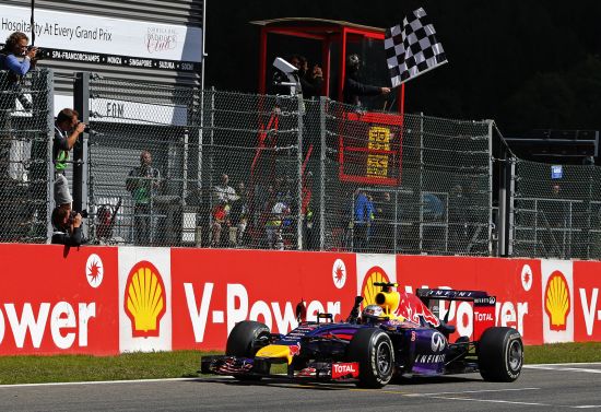 Red Bull Formula One driver Daniel Ricciardo of Australia crosses the finish line to win the Belgian F1 Grand Prix in Spa-Francorchamps
