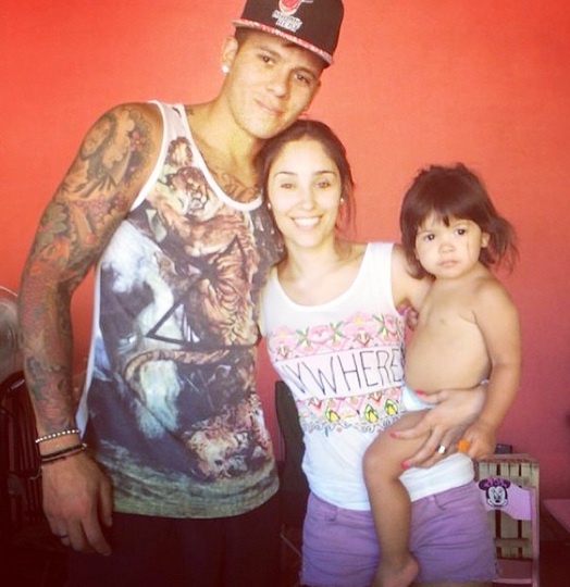 Rojo with his wife and daughter