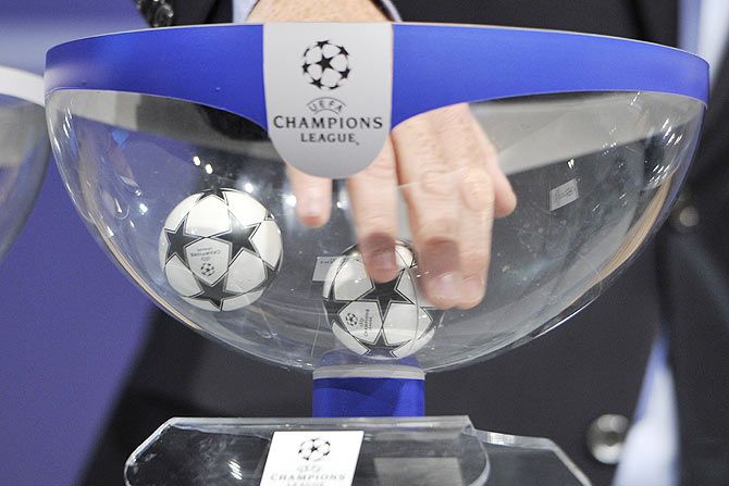  Draw balls are shuffled during the 2014/15 UEFA Champions League draw