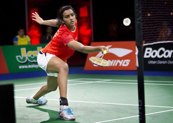 Sindhu dribbles at the net during the Badminton World Championships in Copenhagen. During her early days in training, 'There weren't many girls of Sindhu's calibre, so she always trained with the boys.'