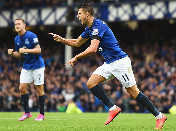 Kevin Mirallas of Everton celebrates scoring his goal