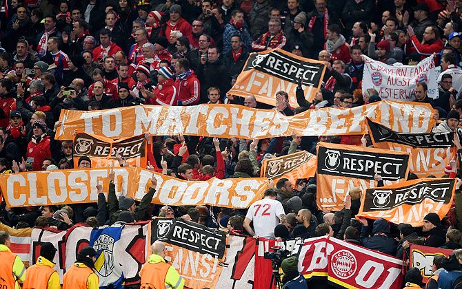 Bayern Munich fans hold up protest banners during the UEFA Champions League Group E match between Manchester City and Bayern Muninvh at the Ethad Stadium in Manchester on November 25. Photograph: Michael Regan/Getty Images