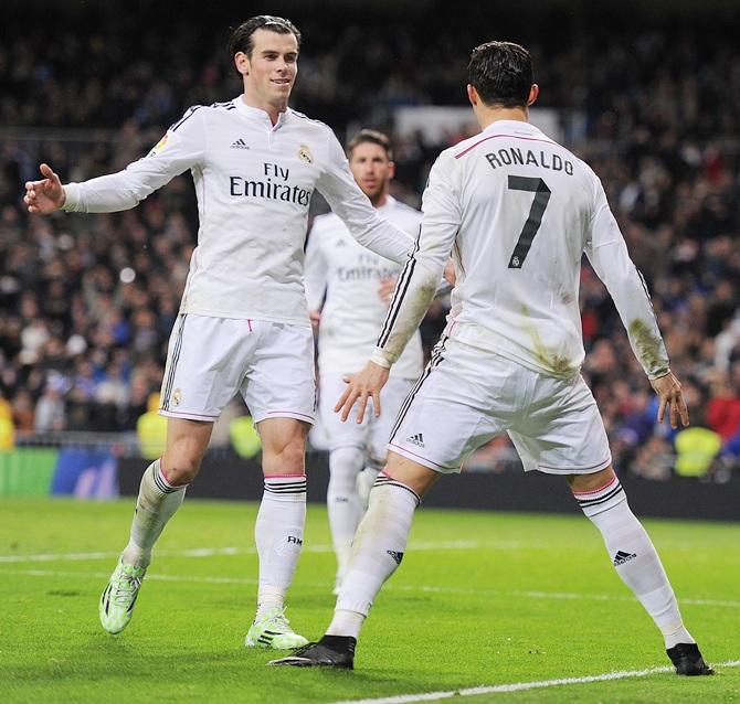 Cristiano Ronaldo of Real Madrid celebrates with Gareth Bale