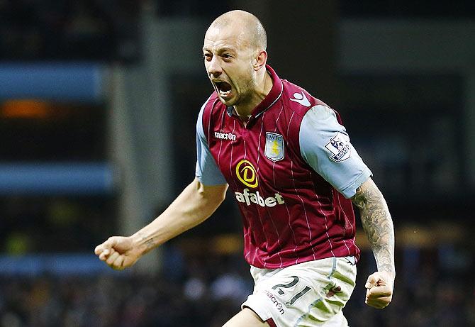 Alan Hutton of Aston Villa celebrates scoring against Leicester City on Sunday