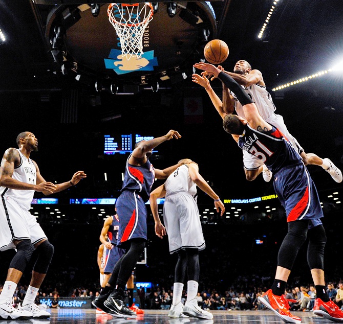 Markel Brown  of the Brooklyn Nets attempts a shot