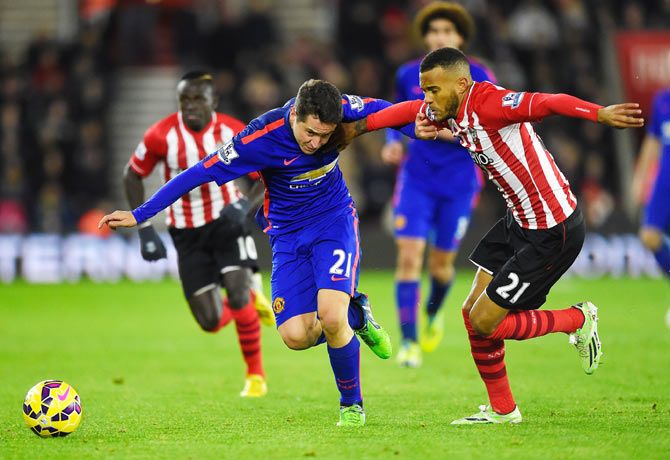 Ander Herrera of Manchester United and Ryan Bertrand of Southampton vie for possession during their match on Monday