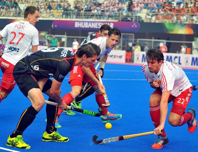 Action from the Champions Trophy hockey match between England and Belgium