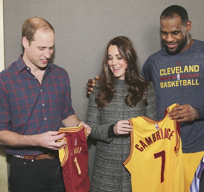 Britain's Prince William, Duke of Cambridge,left, and his wife Catherine, Duchess of Cambridge pose with LeBron James