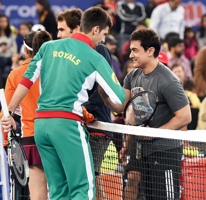 Novak Djokovic with actor Amir Khan 