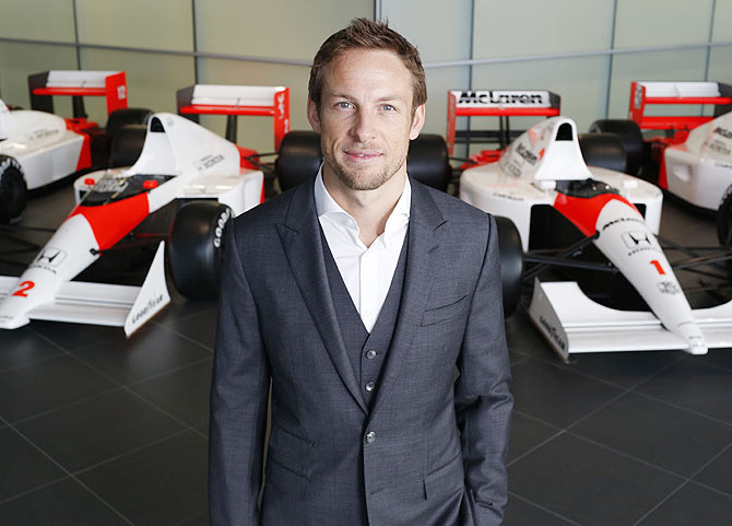 In this handout photo provided by McLaren-Honda, Formula One driver Jenson Button poses as McLaren-Honda announces its new driver line-up for the 2015 season