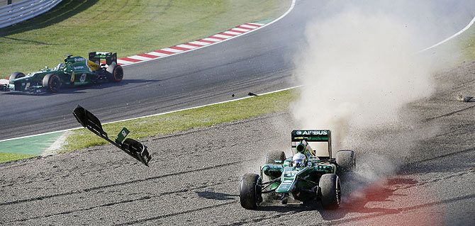 Caterham Formula One driver Giedo van der Garde of Netherlands crashes during the Japanese F1 Grand Prix at the Suzuka circuit on October 13