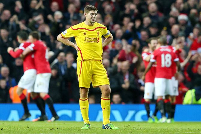 Steven Gerrard looks dejected after Liverpool conceded the third goal against Manchester United on Sunday