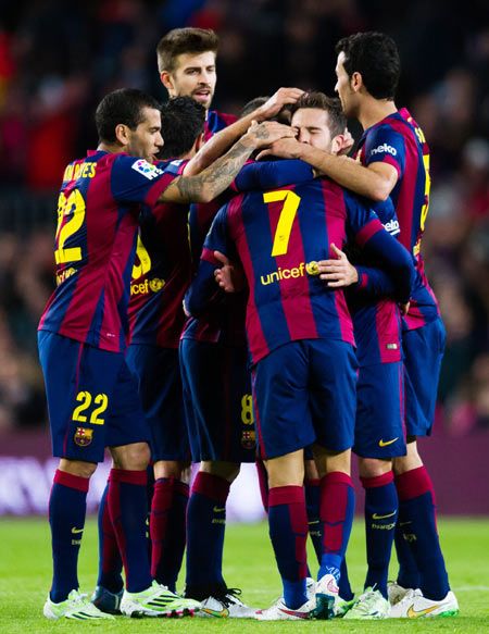 Players of FC Barcelona celebrate after Pedro Rodriguez's goal