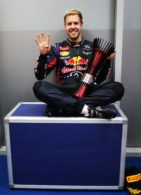Sebastian Vettel celebrates after winning the Indian Grand Prix in 2013