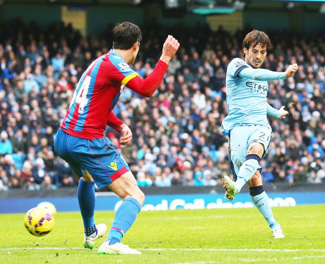 David Silva of Manchester City scores