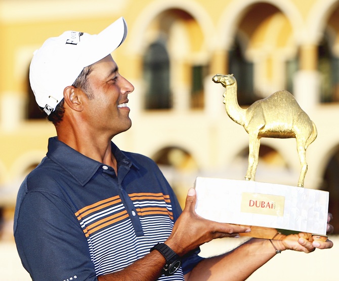 Arjun Atwal of India with the winners trophy