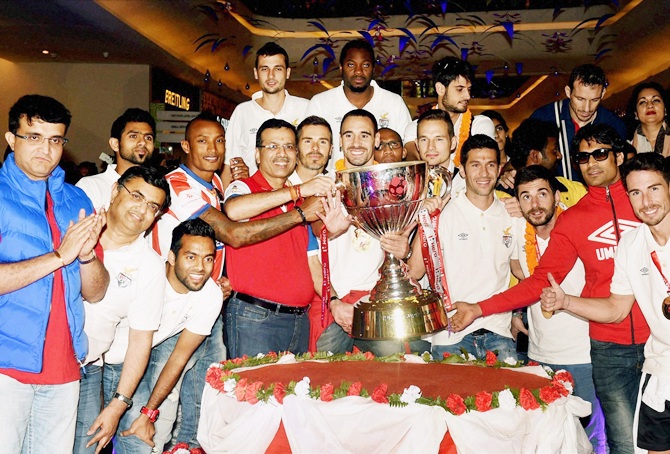 Players of Atletico De Kolkata football team alongwith with their co-owners, Sourav   Ganguly, Sanjiv Goenka 